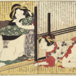 2 women and 1 man in an erotic embrace