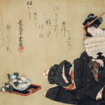 woman with a fan, and a bowl of food in front of her